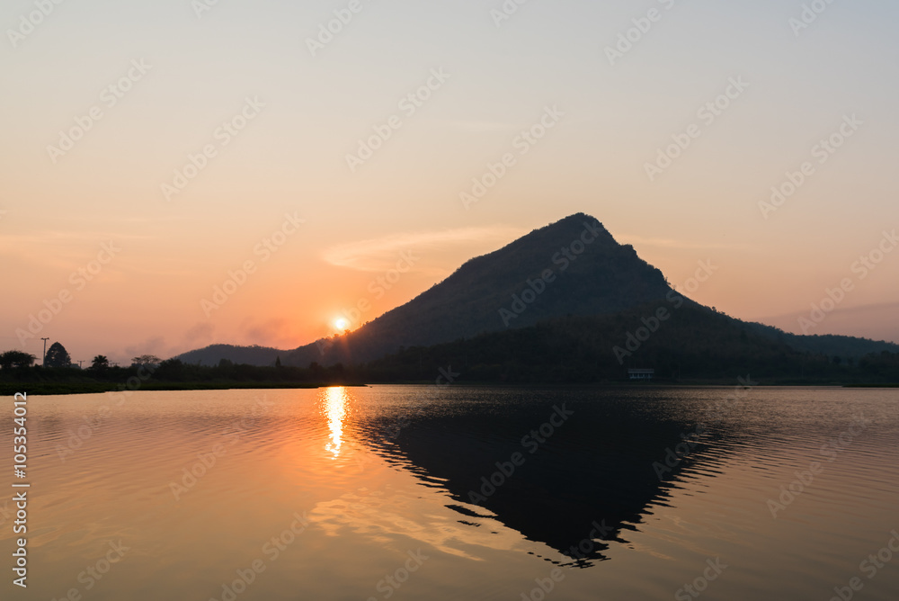 Mountain lake at sunrise.