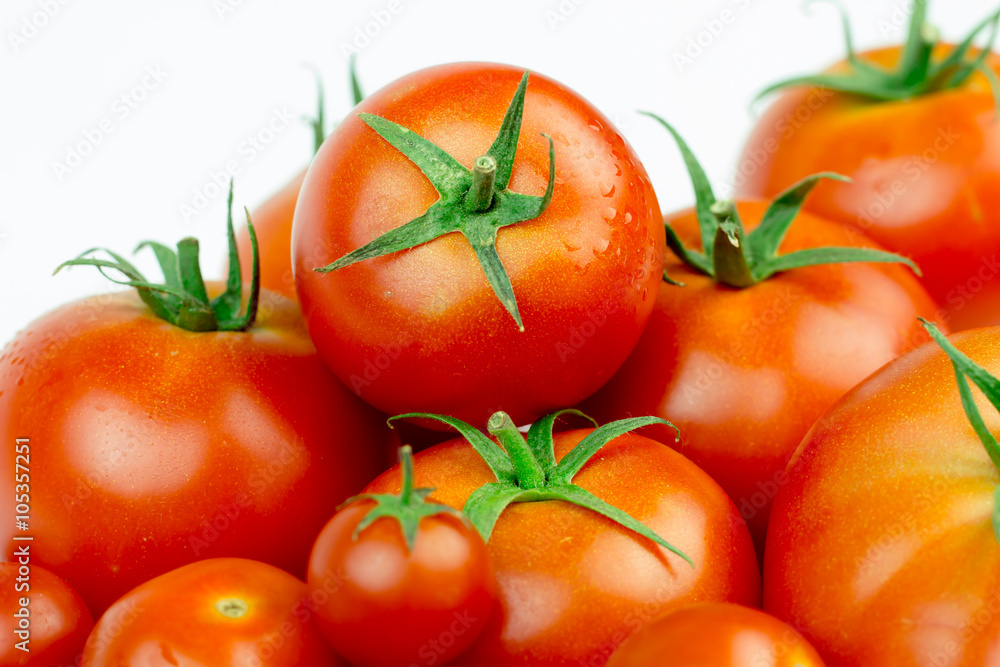 Tomatoes. Whole and a half isolated on white Tomatoes. Whole and a half isolated on white
