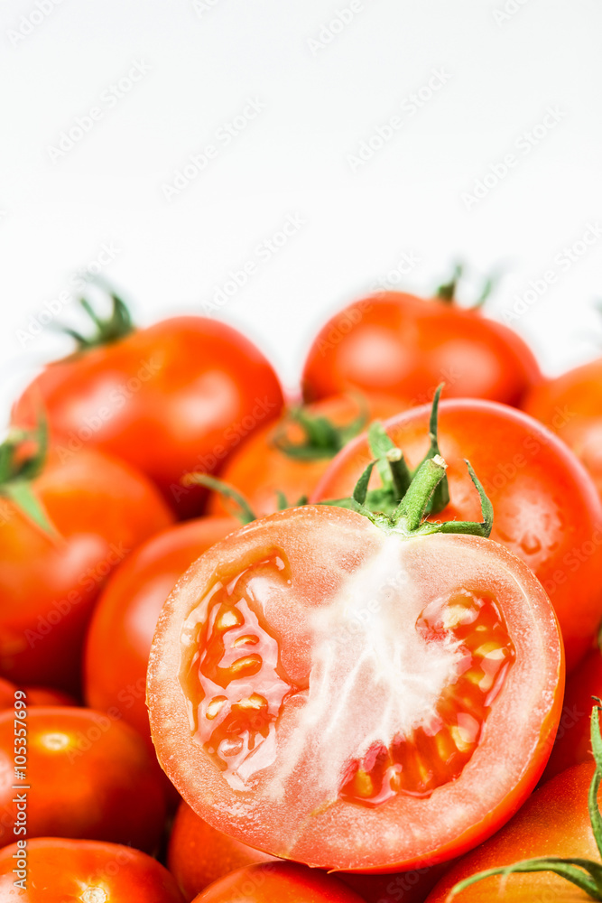 Tomatoes. Whole and a half isolated on white Tomatoes. Whole and a half isolated on white