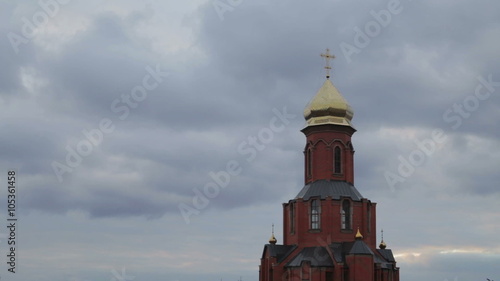 Orthodox church against the sky with clouds