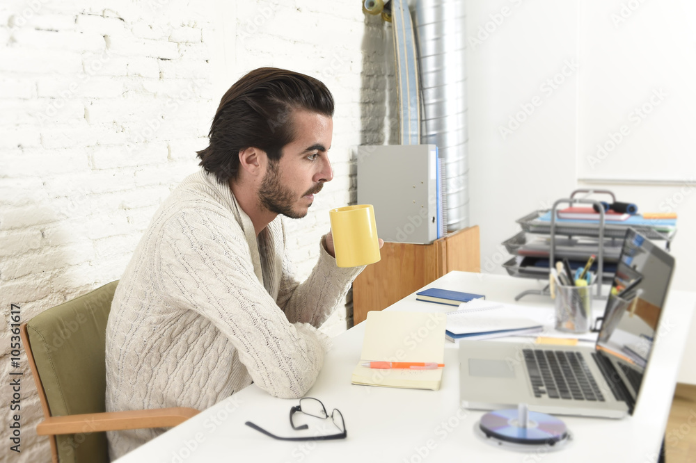 student preparing university project or hipster style freelancer businessman working with laptop student preparing university project or hipster style freelancer businessman working with laptop