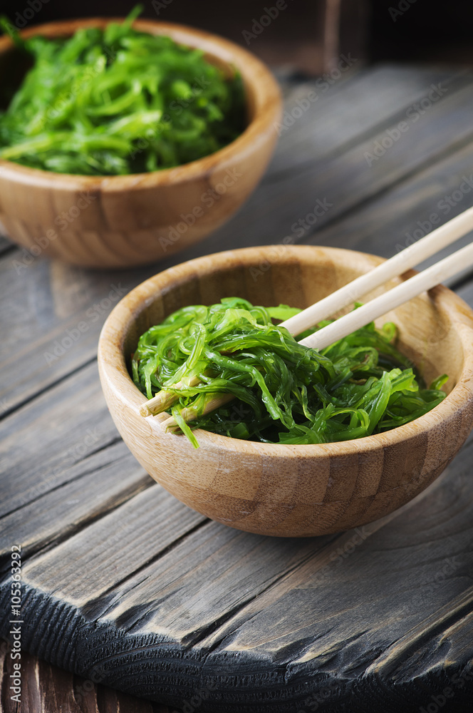 Japanese chuka salad on the wooden table Japanese chuka salad on the wooden table