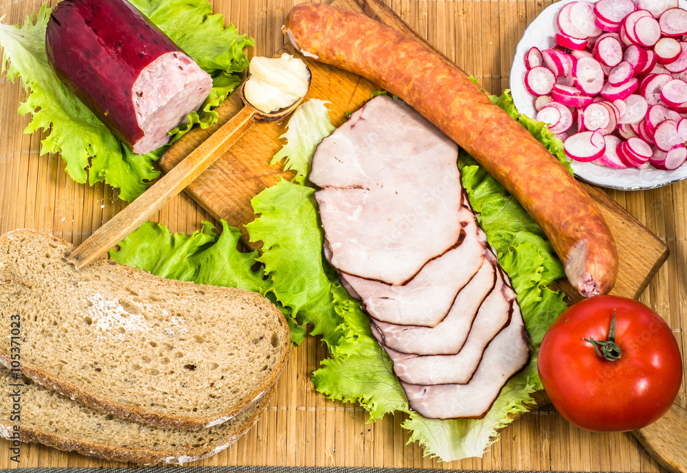 Delicious breakfast with ham and vegetables, flat lay Delicious breakfast with ham and vegetables, flat lay