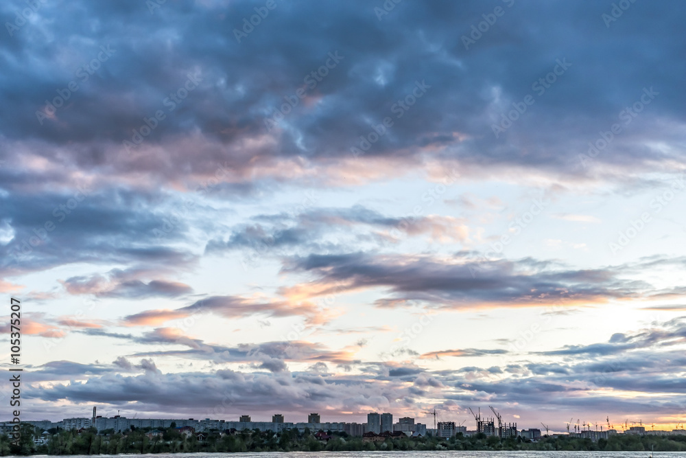 Evening city pond cloudscape view
