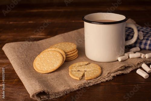 Marshmallow, cookies and cup of coffee