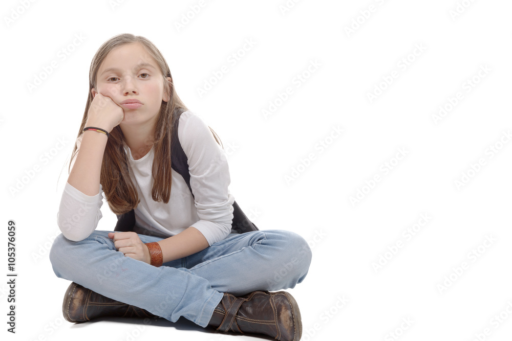 pretty little girl sitting cross-legged. Isolated on white backg pretty little girl sitting cross-legged. Isolated on white backg
