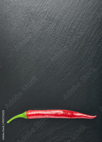 farm fresh chilli, red chilli, black background