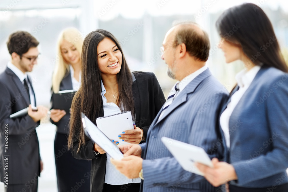 meeting business partners before presentation in the lobby 