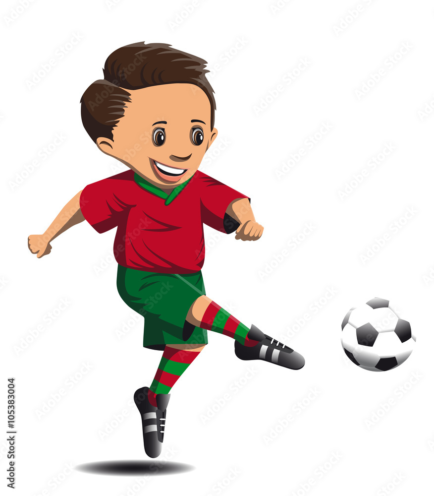 boy football player in a red and green form beats strong foot on the ball