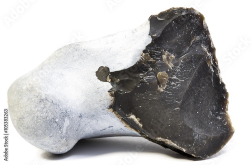 Black flint stone isolated on white background