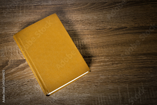 Yellow book on the table