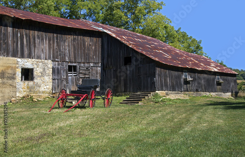 Red carriage and barn 