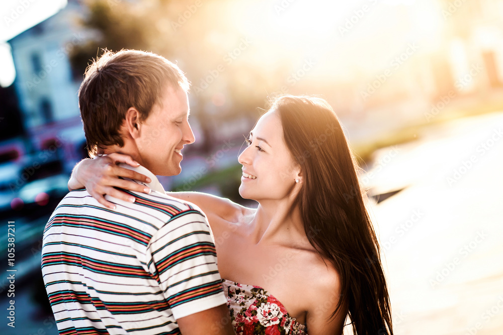 loving couple embraces on the street loving couple embraces on the street