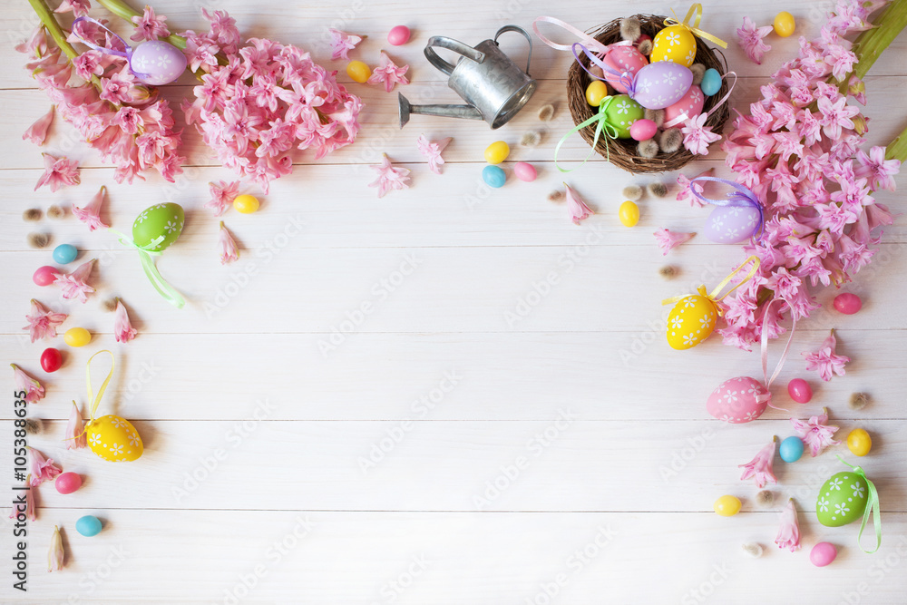 Easter background with flowers hyacinth, nest and colored eggs Easter background with flowers hyacinth, nest and colored eggs