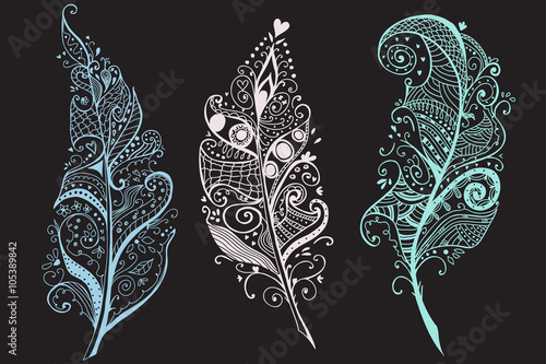 Artistically Hand Drawn, stylized, vector Feathers set
