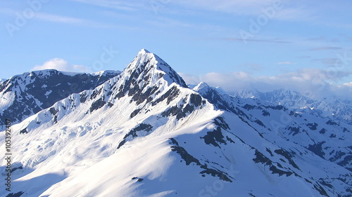 Aerial shot of snowy mountain peak, Alaska