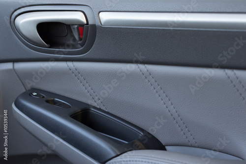 Vehicle Door Panel with Locks and Power Window Buttons Showing © billlivingstone