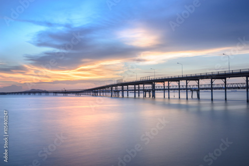 Panorama scene of  transportation cargo bridge to seaport along twilight sky at beautiful © supernanphoto