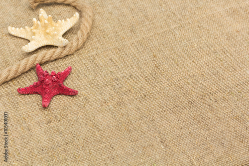 starfish and rope lying on a sackcloth