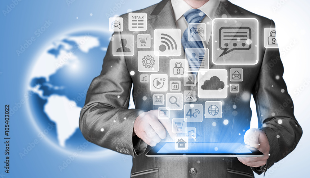 Business man using tablet PC with social media icon set Business man using tablet PC with social media icon set