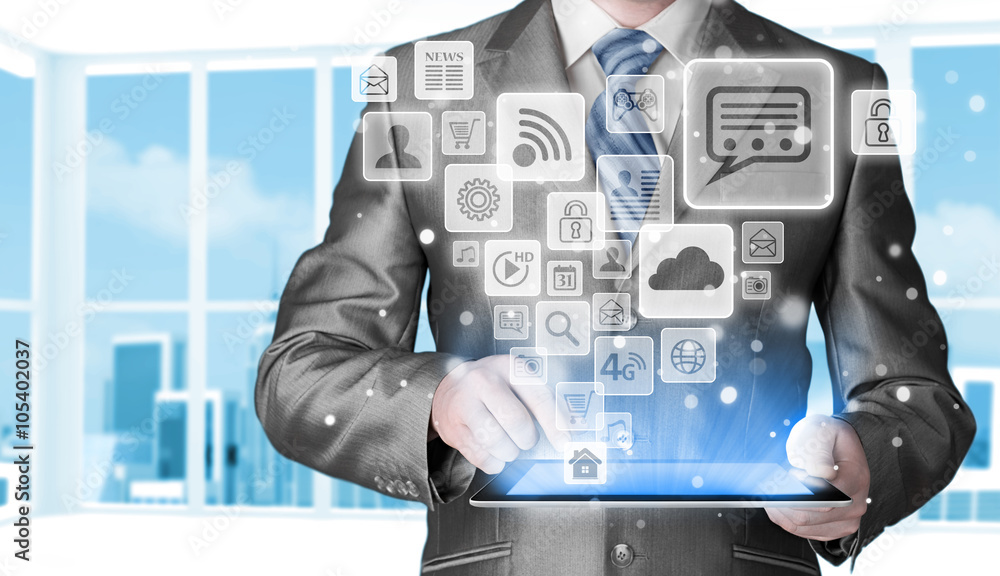 Business man using tablet PC with social media icon set Business man using tablet PC with social media icon set