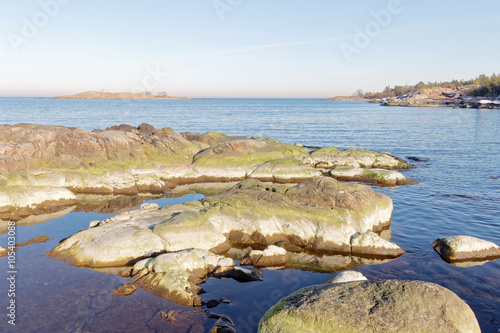 Archipelago, rocks and sea a sunny morning in march photo