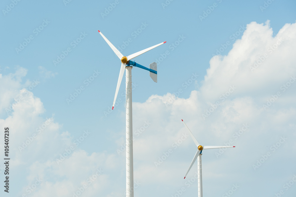 Close up of wind turbines ,blue sky background Close up of wind turbines ,blue sky background