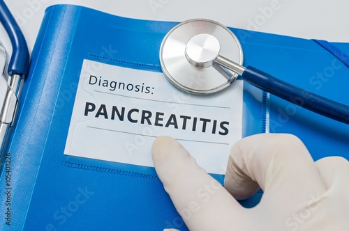 Pancreatitis diagnosis on blue folder with stethoscope.