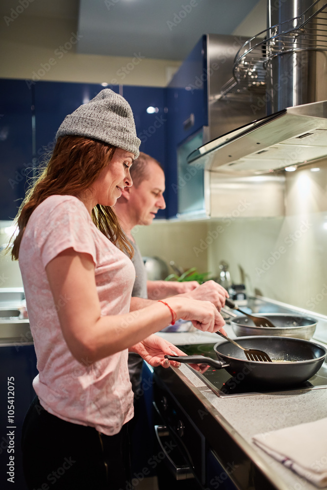 Couple cooking at home Couple cooking at home
