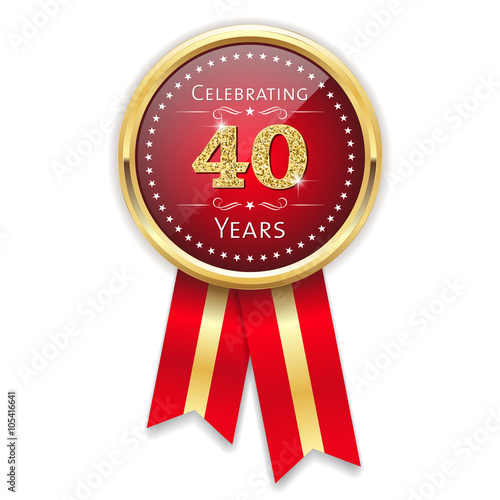 Red celebrating 40 years badge, rosette with gold border and ribbon
