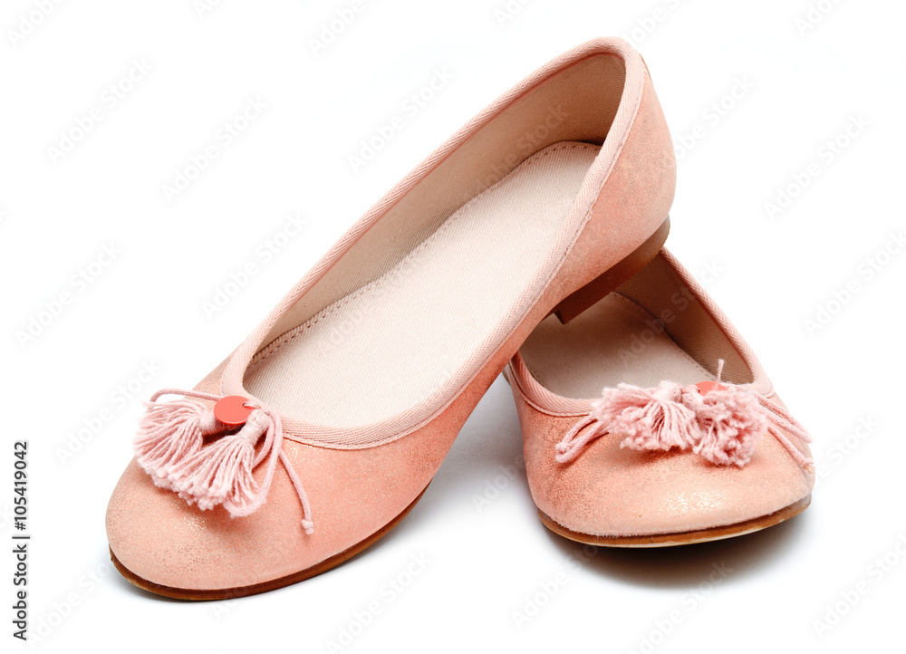 Girl pink shoes isolated on a white Girl pink shoes isolated on a white