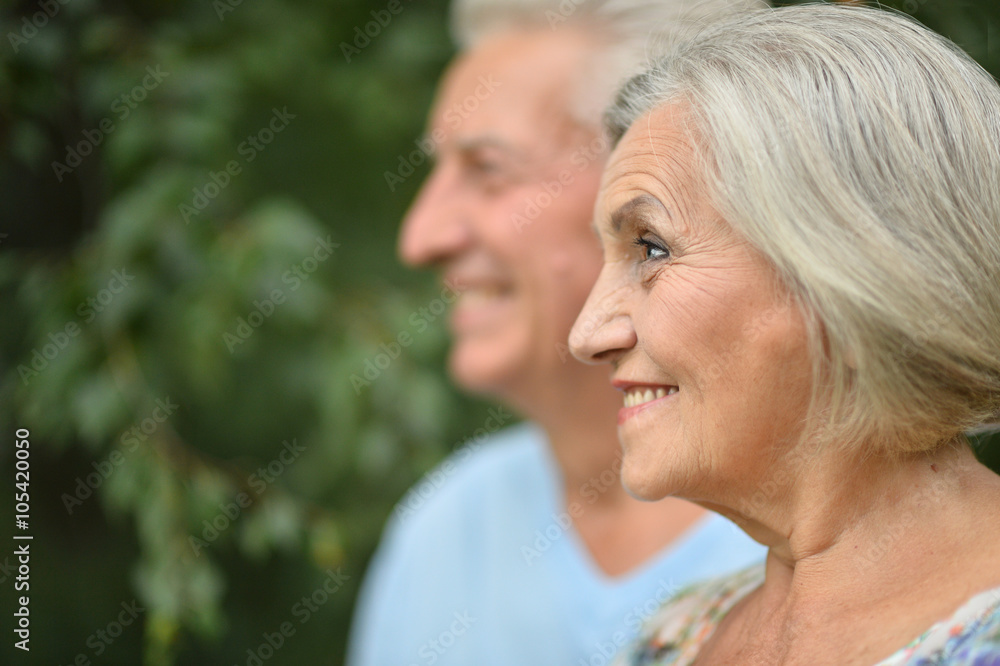 Mature couple on walk in summer Mature couple on walk in summer