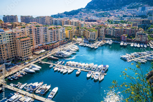  Monaco Montecarlo principality aerial view cityscape. Skyscrapers, mountains and marina. Azure coast. France, Europe.