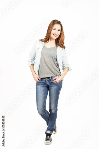 Full length portrait of a expressive beautiful girl on white background. Feeling so happy and confident