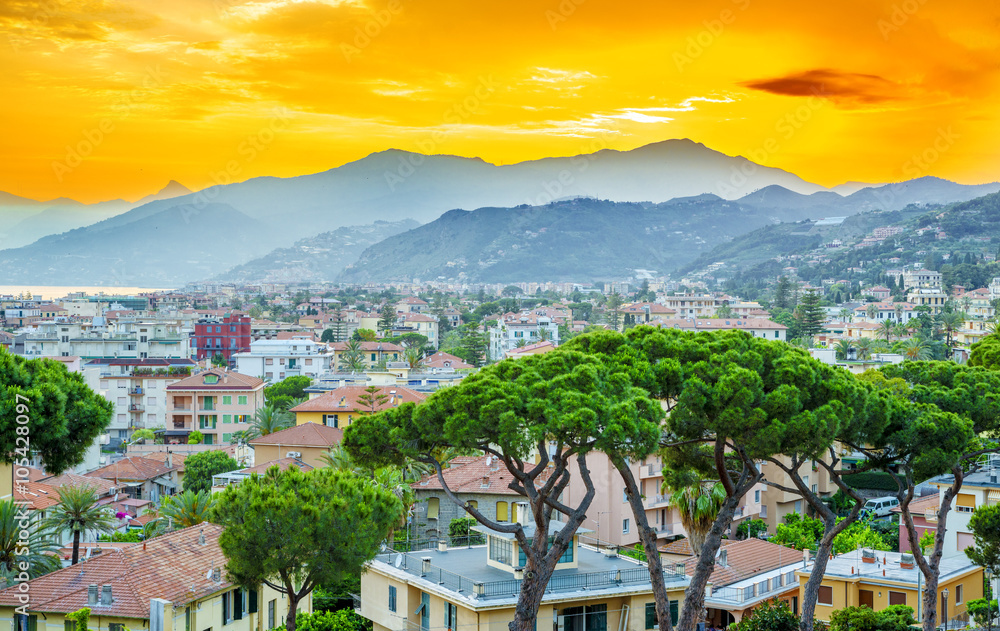 Amazing colorful sunset over the beautiful Italian city Bordighera.