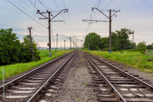 Wide view on a railroad runs to horizint