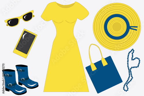 Beauty flat lay yellow and blue set. Yellow buttercup colour sunglasses, mobile phone, hat, dress and snorkel blue bag, beads and shoes