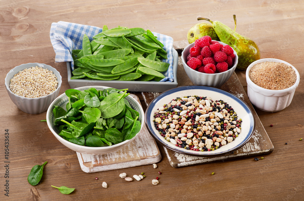 Fiber rich foods on wooden background. Healthy eating. Fiber rich foods on wooden background. Healthy eating.