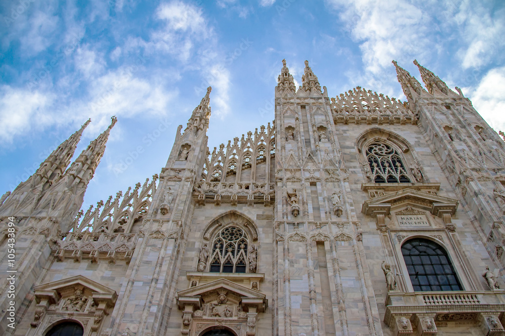 Facade upward closup view of the Milan cathedral, Italy