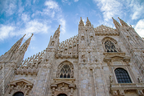 Facade upward closup view of the Milan cathedral, Italy