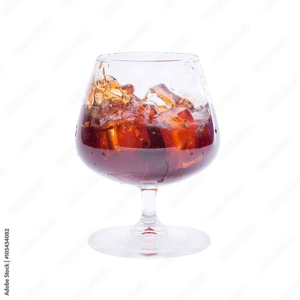 Studio isolated splashing whiskey over white background. Clipping path included. Studio isolated splashing whiskey over white background. Clipping path included.
