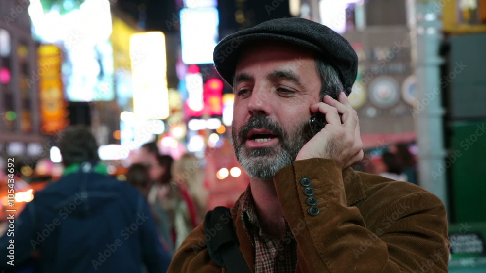 Man talking on cell phone,Times Square, New York City Man talking on cell phone,Times Square, New York City