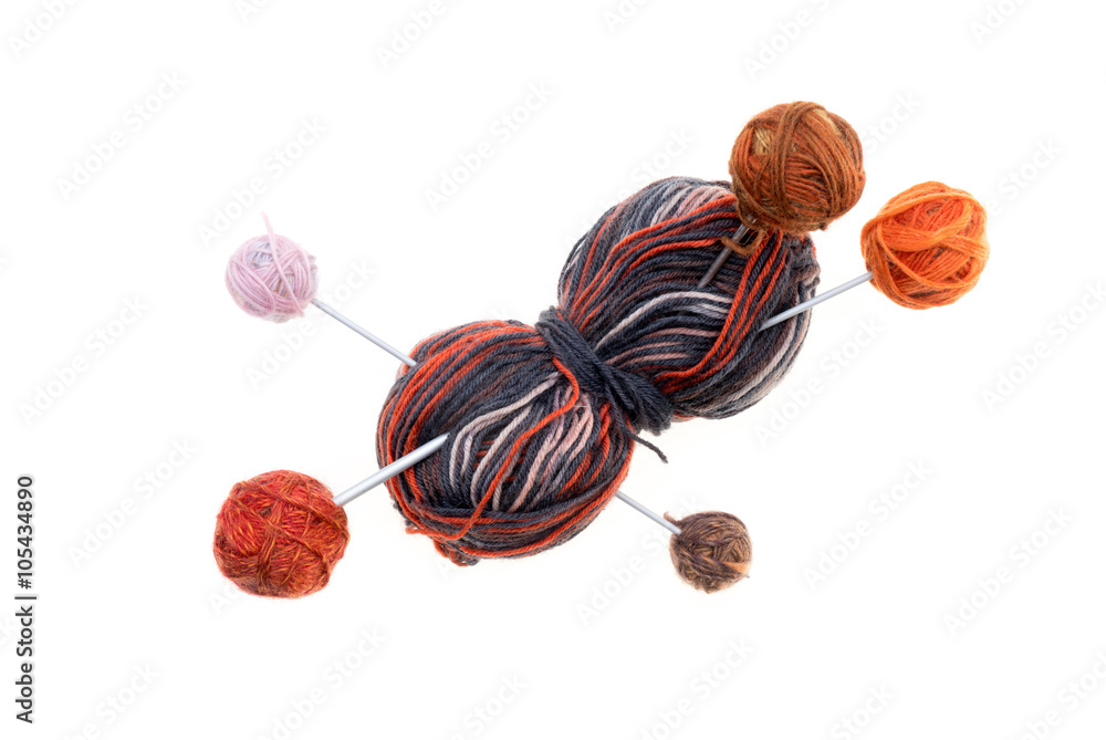 Different colored balls of wool with knitting needles Different colored balls of wool with knitting needles
