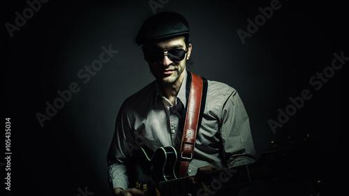 Jazz Musician Playing a Guitar