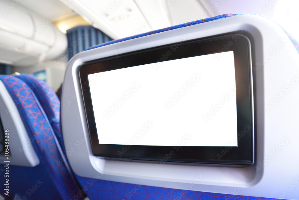 White LCD screen in an airplane seat. White LCD screen in an airplane seat.