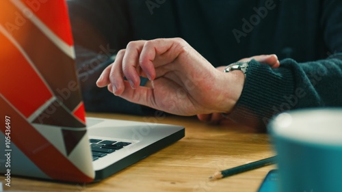 4K - Ultra HD: Bored casual businessman tapping desk with fingers in office while waiting for his clients. 