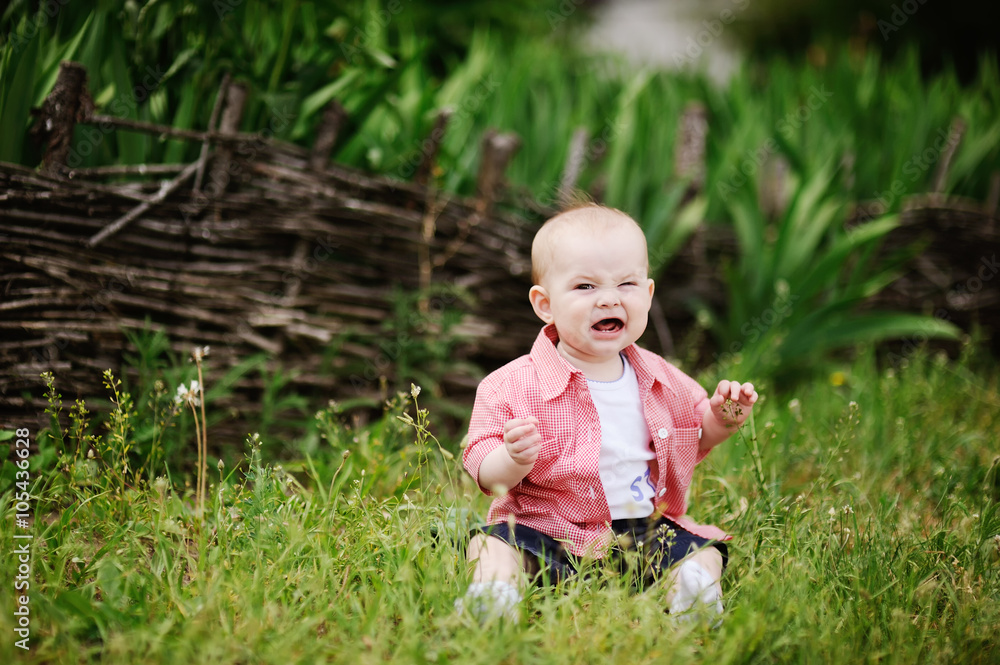 child molester cries while sitting on the grass child molester cries while sitting on the grass