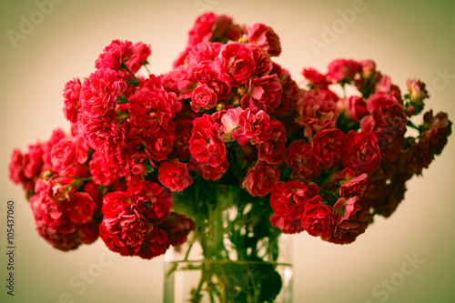 Beautiful bouquet of red roses in vase