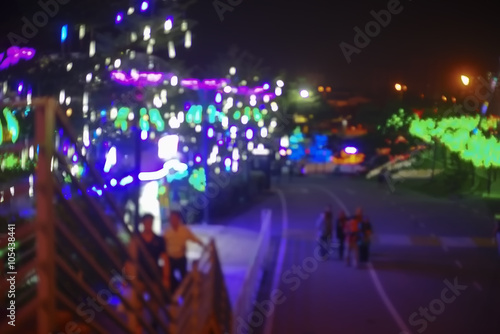 Blur image of modern light at the theme park with bokeh effect. © nelzajamal