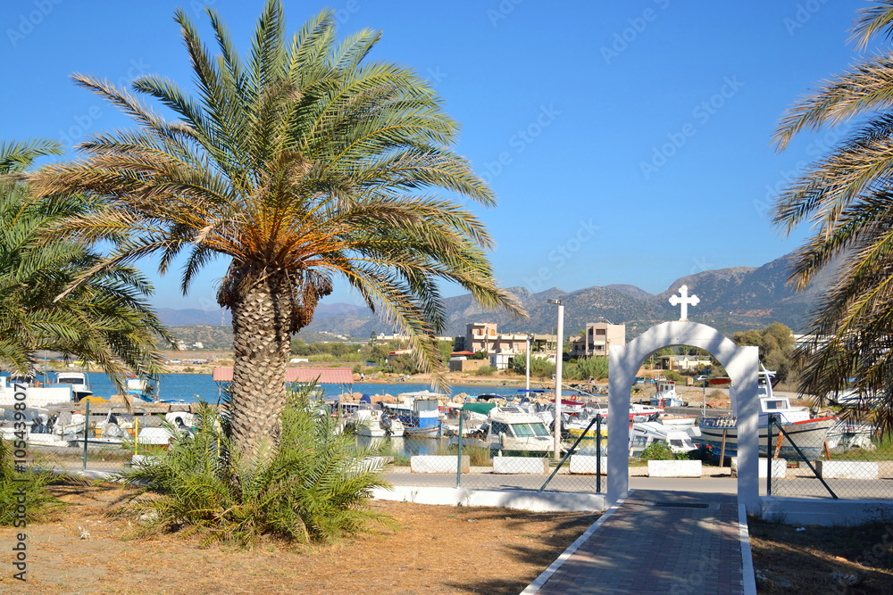 Summer landscape with port of Malia.